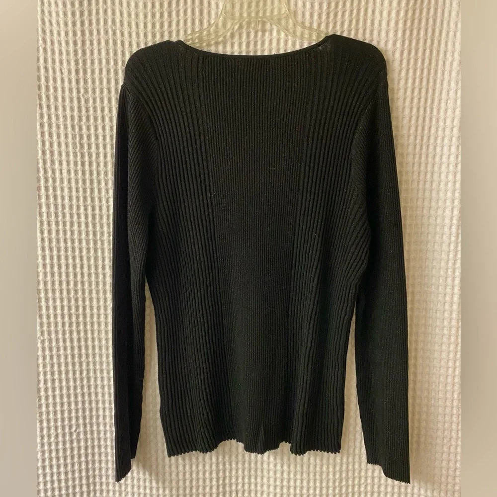 Long sleeved, stretchy shirt. Neckline- V-neck. Color- Black and shimmery. - Picture 2 of 3